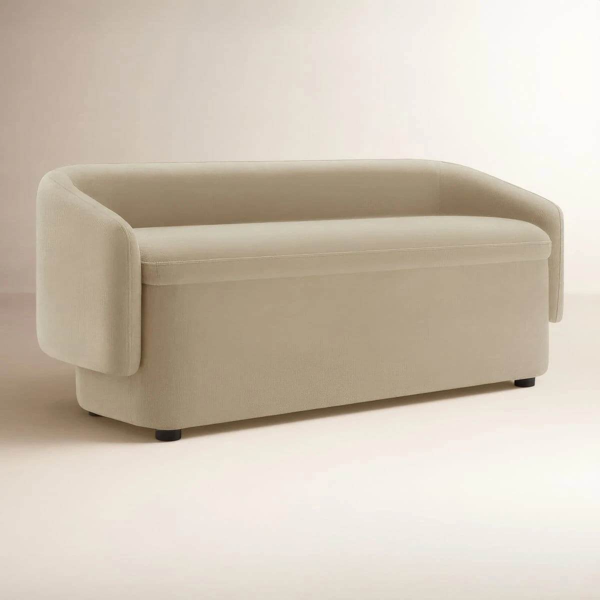 Angled view of Capri Wicker Bredon bench showing rounded arms and black feet