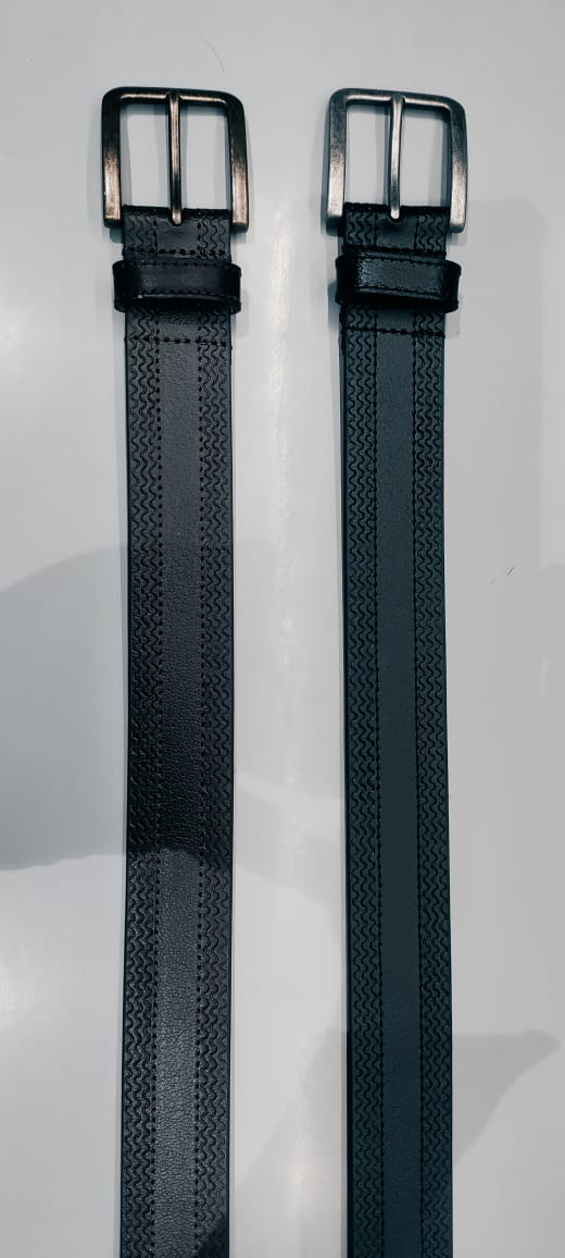 Brown belt coiled flat with smooth strap, keeper loop and shiny gold-tone pin buckle on white background