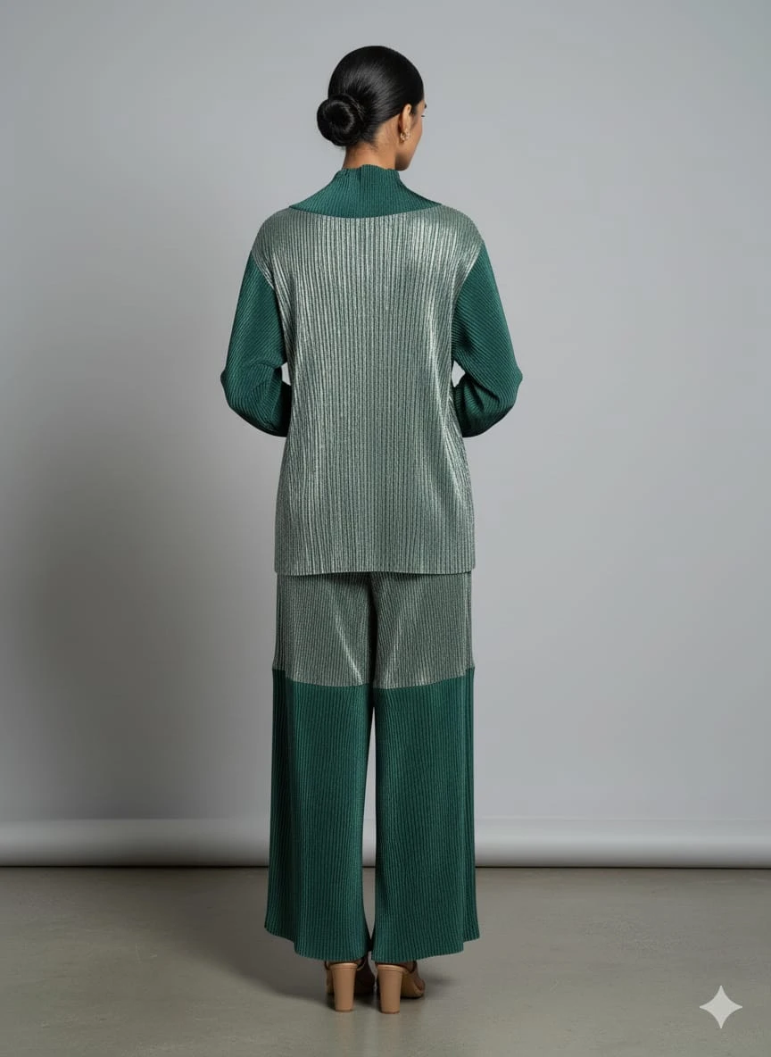 Woman wearing a green and silver pleated kurta with matching wide-leg palazzo pants