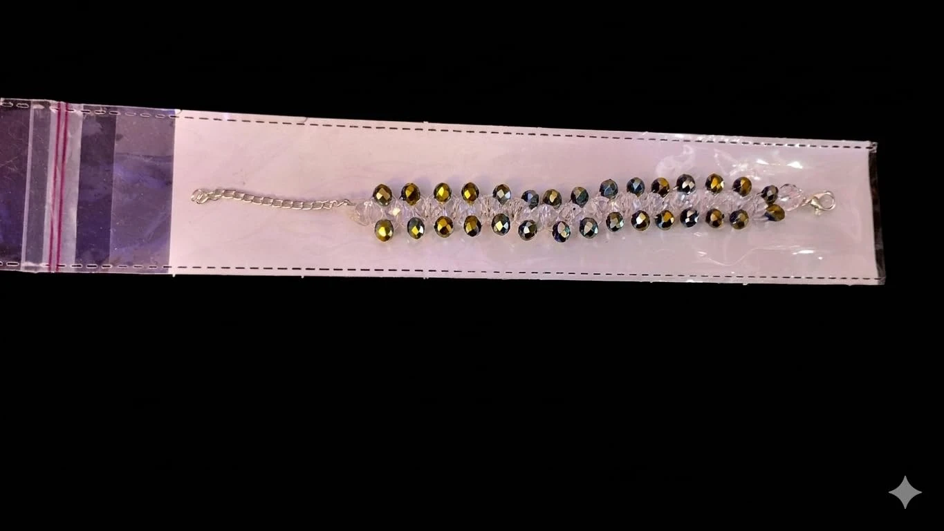 Handmade Dual Tone Crystal Cut Sea Green Criss- Cross Beaded Bracelet with adjustable Elastic Thread view 3