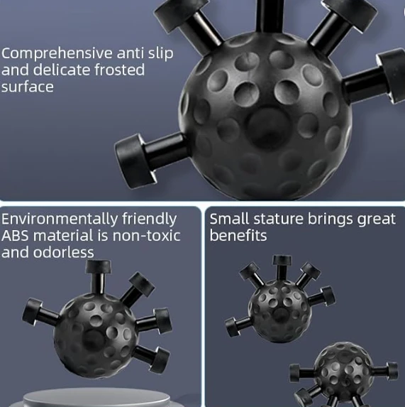 Hand holding a black finger exerciser ball with five spring-loaded finger grips