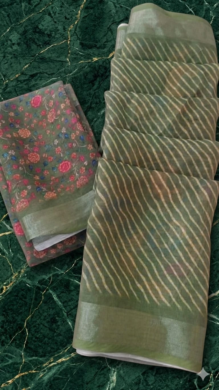 Green silk saree with peacock and floral print, striped pallu and matching blouse piece